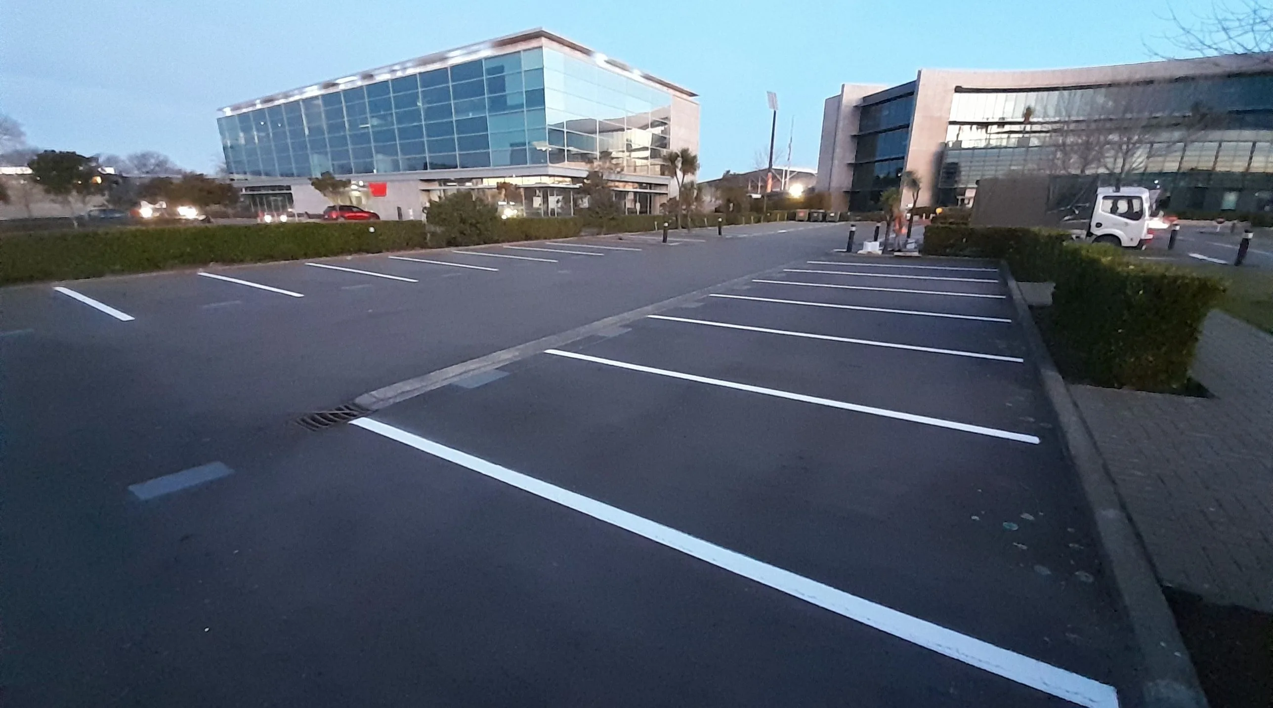 Directional arrows and loading bay markings refreshed for a logistics hub in Albany.