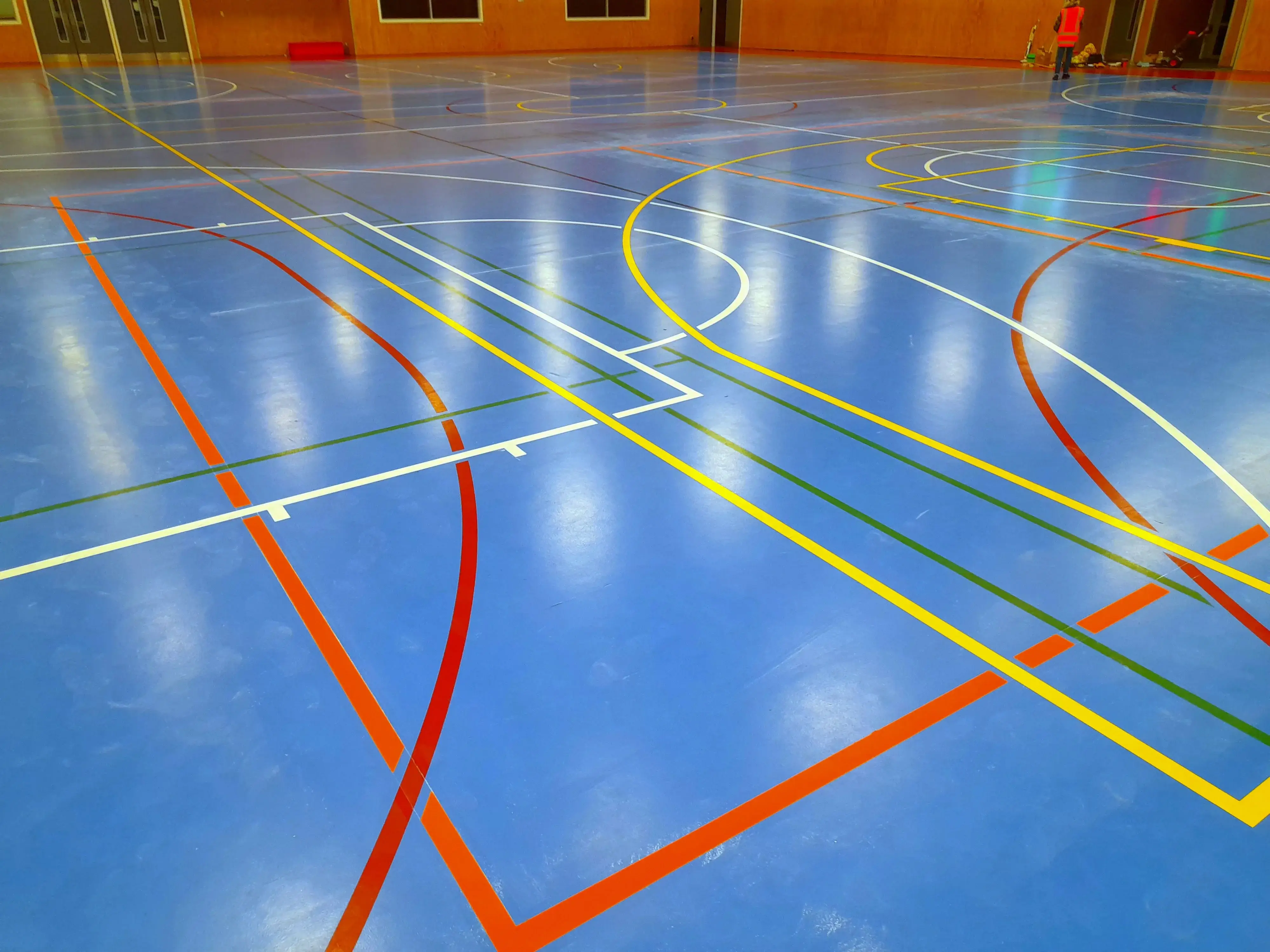 Sports court line marking for schools and recreation facilities across Auckland.