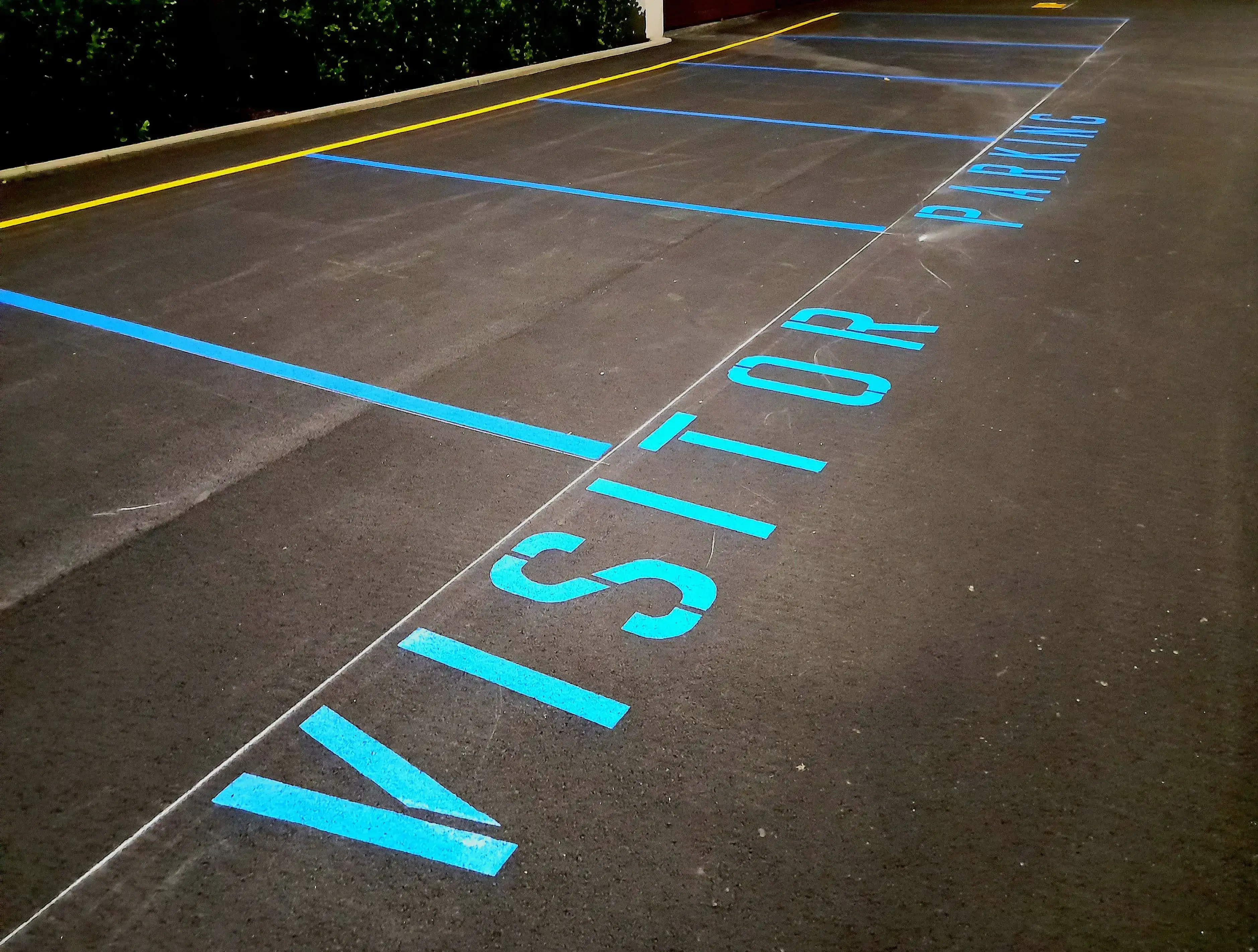 Custom stencilling, numbering and lettering for commercial car parks and industrial sites.