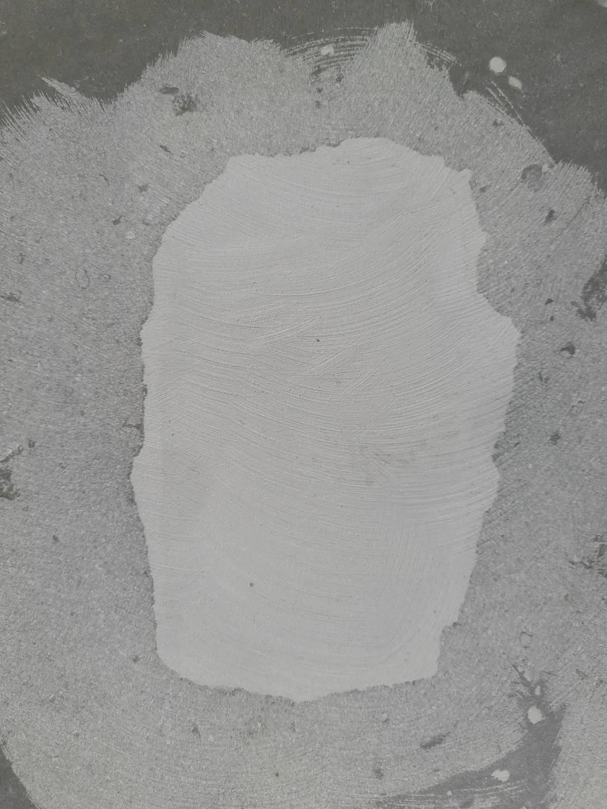 Bolt holes filled flush with epoxy after make-good — Wigram industrial unit Christchurch