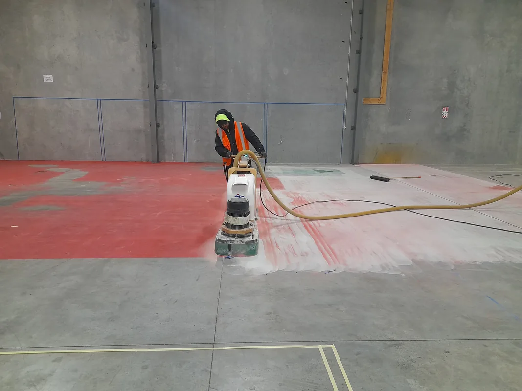 Industrial line removal and re-marking on warehouse concrete floor