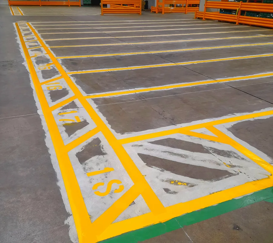 Clear warehouse bay stencilling and floor lines to support safe traffic flow.